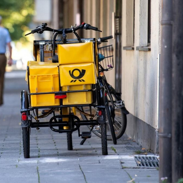 &lt;p&gt;09 September 2020, Bavaria, Munich: A bicycle from the Deutsche Post is parked on a street. In view of the next round of negotiations with the German Postal Service, the union Verdi has called for warning strikes. Photo: Sven Hoppe/dpa (Photo by SVEN HOPPE/DPA/dpa Picture-Alliance via AFP)&lt;/p&gt;