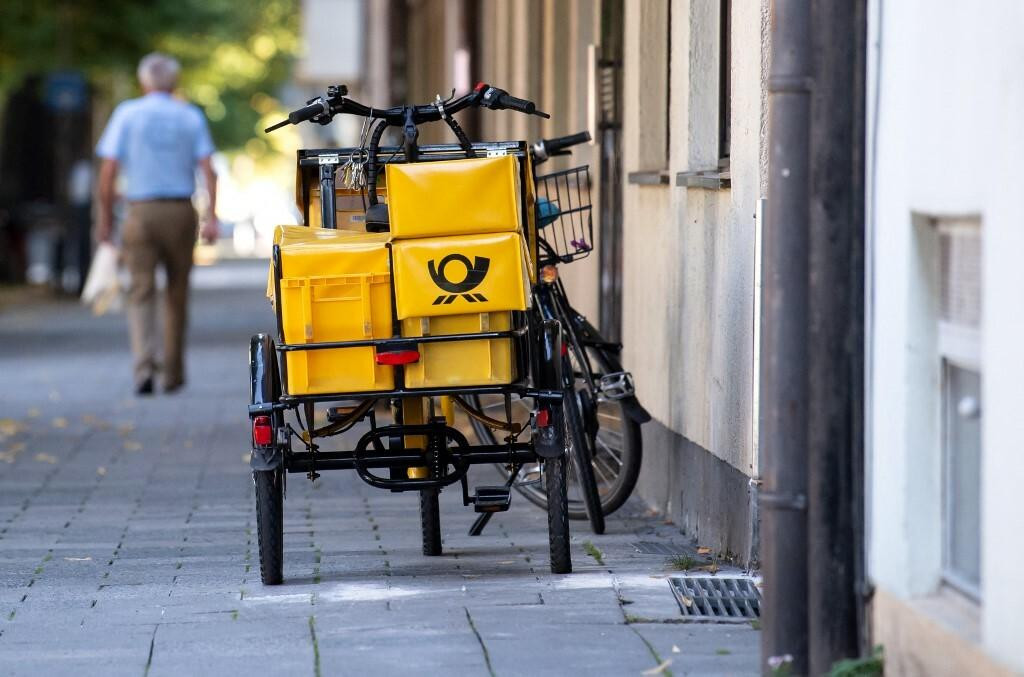 &lt;p&gt;09 September 2020, Bavaria, Munich: A bicycle from the Deutsche Post is parked on a street. In view of the next round of negotiations with the German Postal Service, the union Verdi has called for warning strikes. Photo: Sven Hoppe/dpa (Photo by SVEN HOPPE/DPA/dpa Picture-Alliance via AFP)&lt;/p&gt;