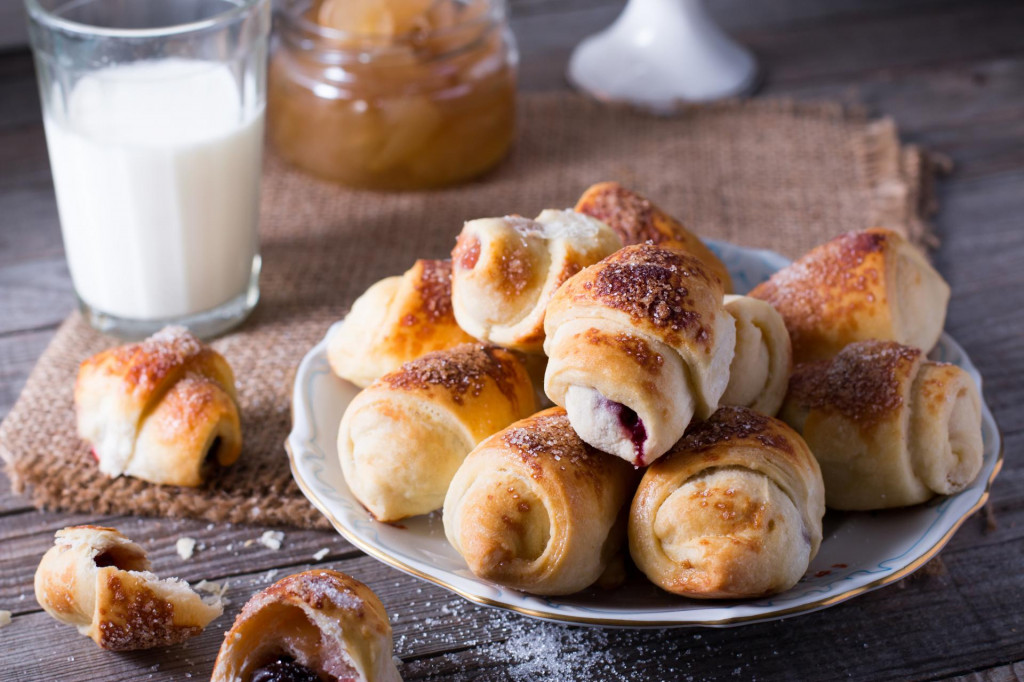&lt;p&gt;Rugelach with jam filling on plate with milk on background&lt;/p&gt;