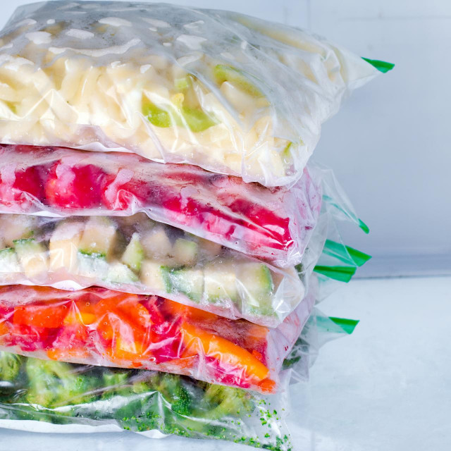 &lt;p&gt;Bags with frozen vegetables in refrigerator, closeup&lt;/p&gt;