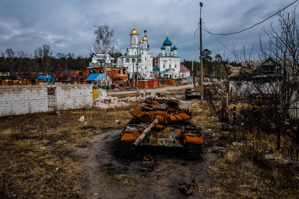 &lt;p&gt;A destroyed Russian T-72 tank is photographed near Pokrovy Presvyatoyi Bohorodytsi Church, in the city of Svyatohirs‘k, Donetsk region on March 1, 2023, amid the Russian invasion of Ukraine. (Photo by Ihor TKACHOV/AFP)&lt;/p&gt;