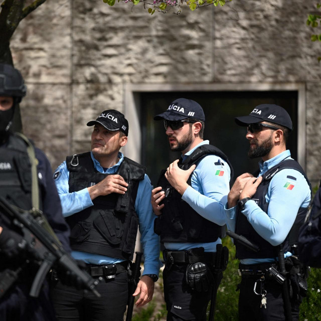 &lt;p&gt;Portuguese police officers stand guard in front of the Ismaili Islamic centre in Lisbon, after two people died following a knife attack that wounded several others, on March 28, 2023. - ”The attack left several people wounded and, for the moment, two dead,” said police, adding that the suspected assailant had been arrested. (Photo by PATRICIA DE MELO MOREIRA/AFP)&lt;/p&gt;