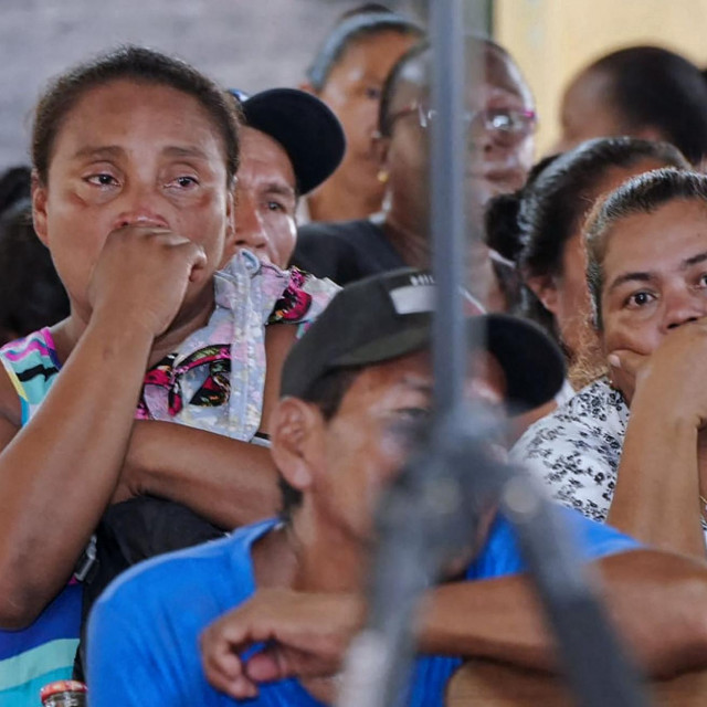 &lt;p&gt;Relatives and friends of the victims of a fire on the eve that killed at least 19 youths and injured about 20 others in a schoolgirls‘ dormitory, cry during a meeting with Guyana‘s President Irfaan Ali, in Mahdia, Guyana, on May 22, 2023. At least 19 youths were killed in a schoolgirls‘ dormitory blaze in Guyana. It is not yet known how the fire started on Sunday in a dormitory housing girls aged 11-12 and 16-17, a person who helped the emergency services said under condition of anonymity. The building was gutted by the inferno. (Photo by Keno GEORGE/AFP)&lt;/p&gt;