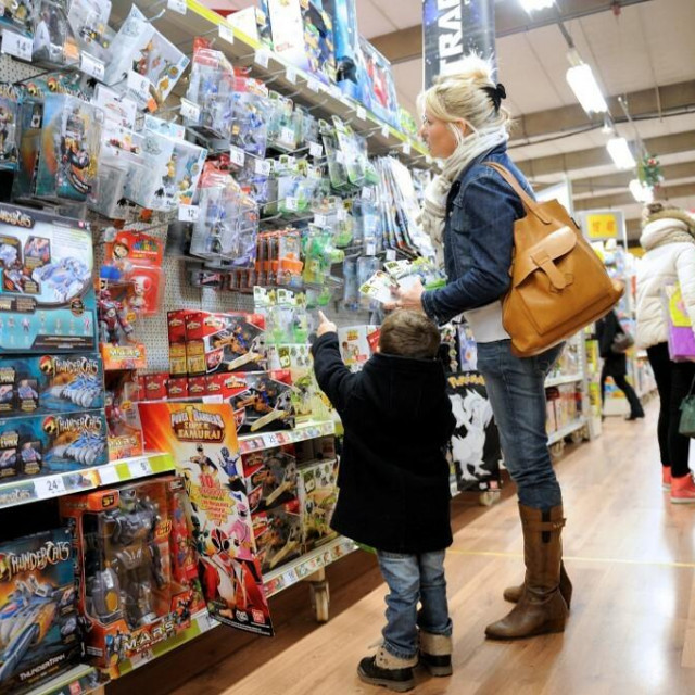 &lt;p&gt;A boy and his mother look at toys as they buy Christmas gifts on December 15, 2012 in a toy store in Lille, northern France. AFP PHOTO/PHILIPPE HUGUEN (Photo by PHILIPPE HUGUEN/AFP)&lt;/p&gt;