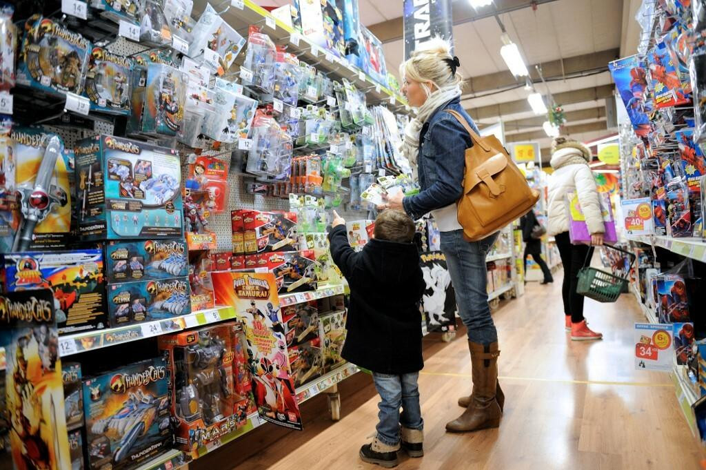 &lt;p&gt;A boy and his mother look at toys as they buy Christmas gifts on December 15, 2012 in a toy store in Lille, northern France. AFP PHOTO/PHILIPPE HUGUEN (Photo by PHILIPPE HUGUEN/AFP)&lt;/p&gt;