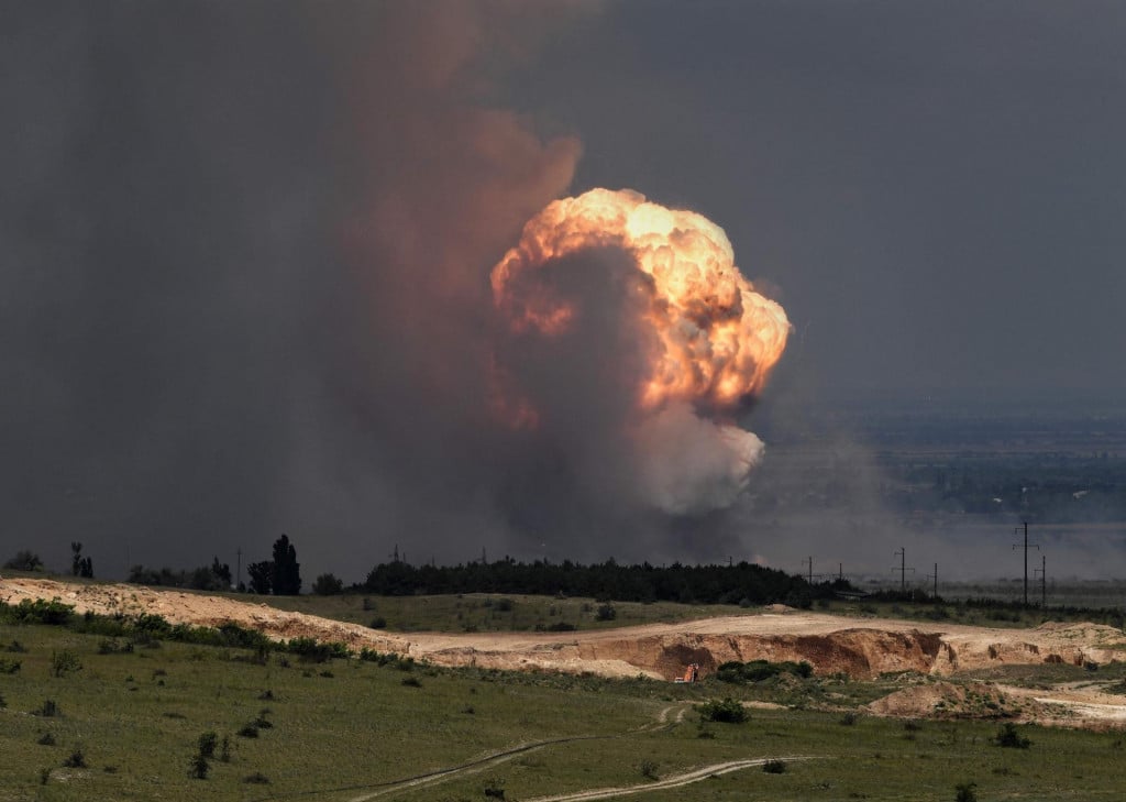 &lt;p&gt;TOPSHOT - A picture shows detonation of ammunition caused by a fire at a military training field in the Kirovsky district of Crimea on July 19, 2023. Russian President Vladimir Putin has been informed about a fire at a military site in Moscow-annexed Crimea that forced authorities to evacuate thousands of civilians on July 19, 2023, the Kremlin said. News of the blaze came two days after Ukraine used waterborne drones to attack the Kerch bridge, a key military supply artery from mainland Russia to annexed Crimea. Authorities ordered the evacuation of over 2,000 residents from areas near the military field. A section of the Tavrida highway -- connecting the eastern Crimean port of Kerch to the port of Sevastopol on the peninsula‘s Black Sea coast -- was closed due to the fire. (Photo by Viktor KOROTAYEV/Kommersant Photo/AFP)/Russia OUT&lt;/p&gt;