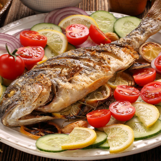&lt;p&gt;Grilled fish with roasted potatoes and vegetables on the plate&lt;/p&gt;