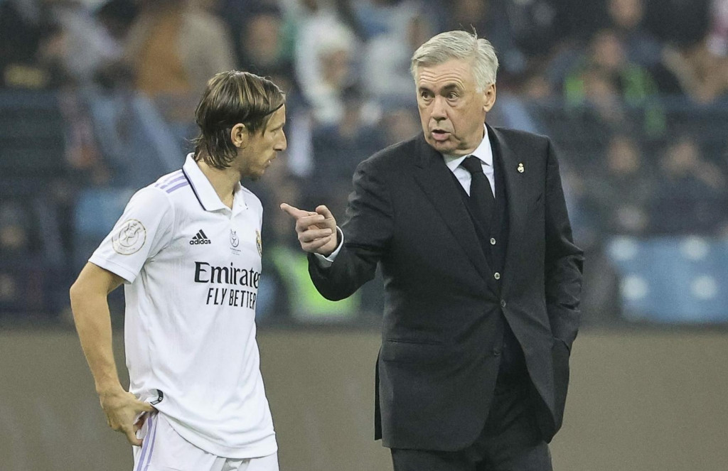 &lt;p&gt;Real Madrid‘s Croatian midfielder Luka Modric (L) speaks with Real Madrid‘s Italian coach Carlo Ancelotti at half-time during the Spanish Super Cup final football match between Real Madrid CF and FC Barcelona at the King Fahd International Stadium in Riyadh, Saudi Arabia, on January 15, 2023. (Photo by Giuseppe CACACE/AFP)&lt;/p&gt;