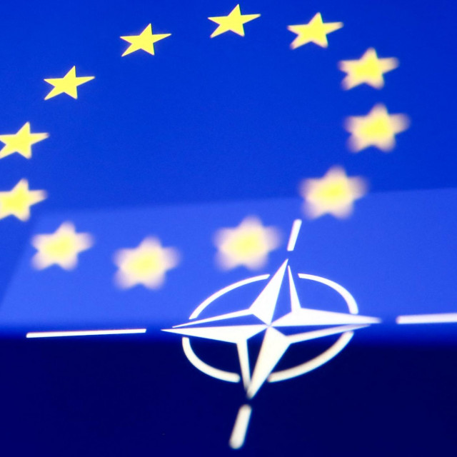 <p>Flags of European Union and NATO displayed on phone screens are seen in this multiple exposure illustration photo taken in Krakow, Poland on May 15, 2022. (Photo illustration by Jakub Porzycki/NurPhoto) (Photo by Jakub Porzycki/NurPhoto/NurPhoto via AFP)</p>