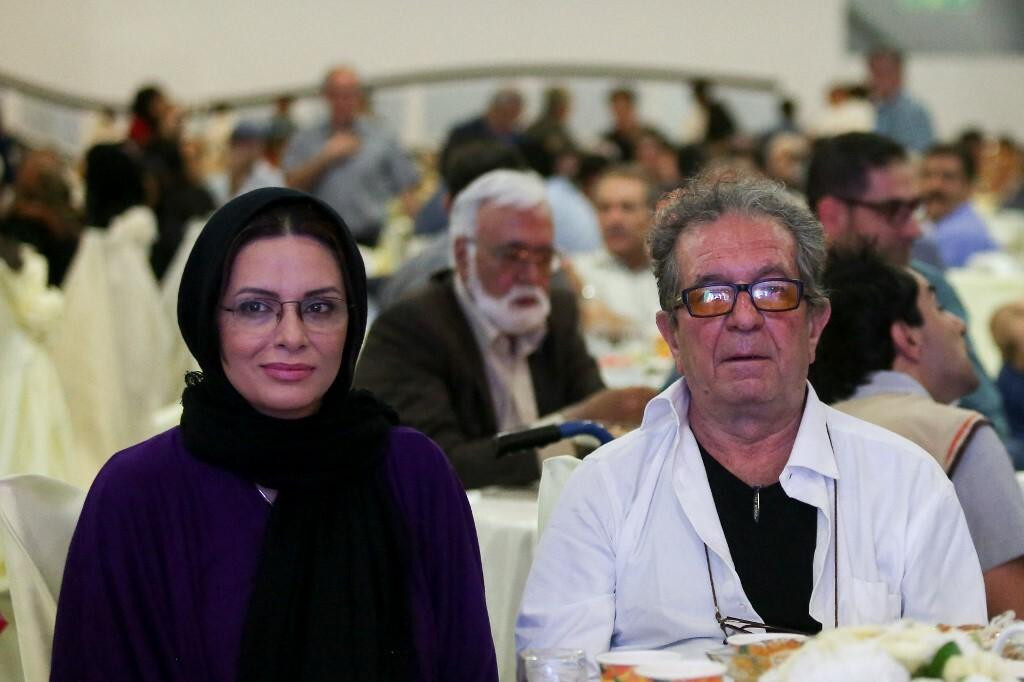 &lt;p&gt;(FILES) Iranian film director Dariush Mehrjui and his wife Vahida Mohammadifar attend a ceremony in Tehran on July 1, 2015. One of Iran‘s most important film-makers, Mehrjui, was stabbed to death on October 14 alongside his wife at their home near the Iranian capital. The 83-year-old was indelibly associated with the Iranian new wave of cinema, having made ”The Cow” in 1969, one of the movement‘s first films. (Photo by Abdulwahed MIRZAZADEH/isna news/AFP)&lt;/p&gt;