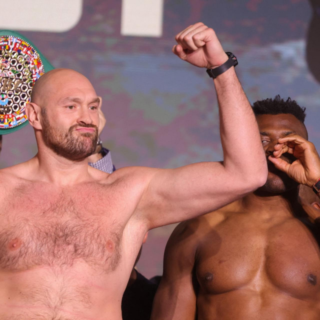 &lt;p&gt;Britain‘s Tyson Fury (L) and Cameroonian-French Francis Ngannou react during their weigh-in on the eve of their bout in Riyadh on October 27, 2023. (Photo by Fayez NURELDINE/AFP)&lt;/p&gt;