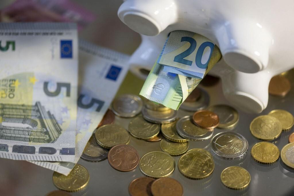 &lt;p&gt;ILLUSTRATION - 23 October 2023, Saxony, Leipzig: ILLUSTRATION - Money is in the belly of a piggy bank. October 30, 2023 is World Savings Day Photo: Hendrik Schmidt/dpa (Photo by HENDRIK SCHMIDT/DPA/dpa Picture-Alliance via AFP)&lt;/p&gt;
