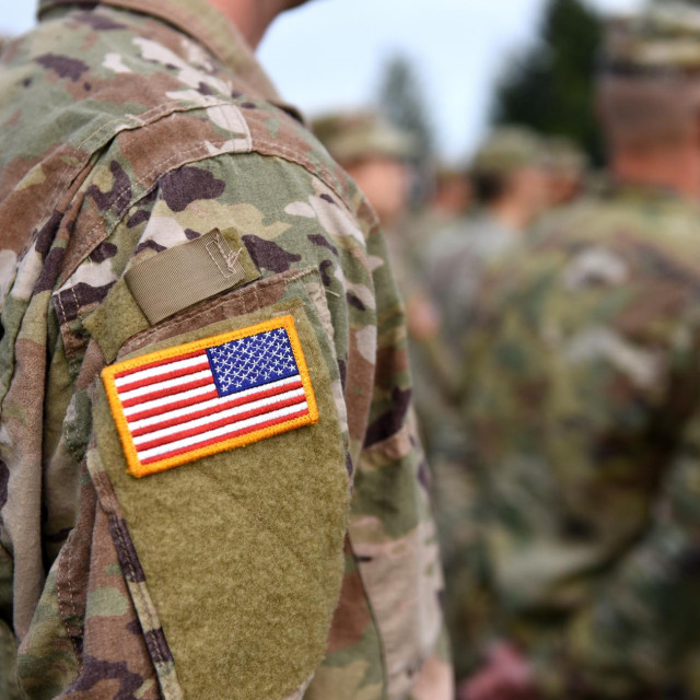 &lt;p&gt;USA patch flag on soldiers arm. US troops&lt;/p&gt;