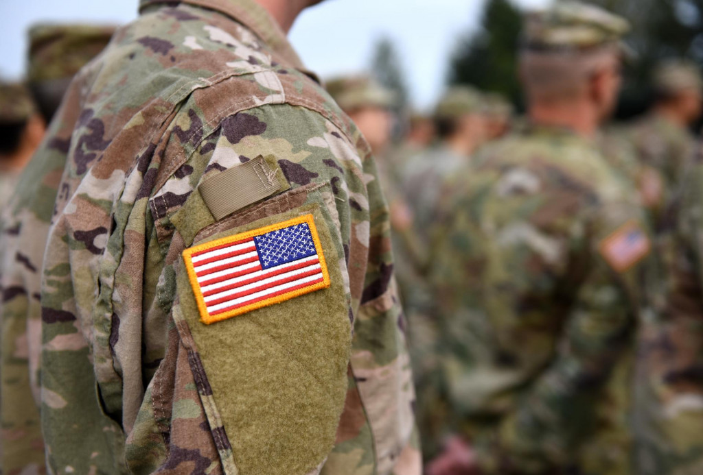 &lt;p&gt;USA patch flag on soldiers arm. US troops&lt;/p&gt;