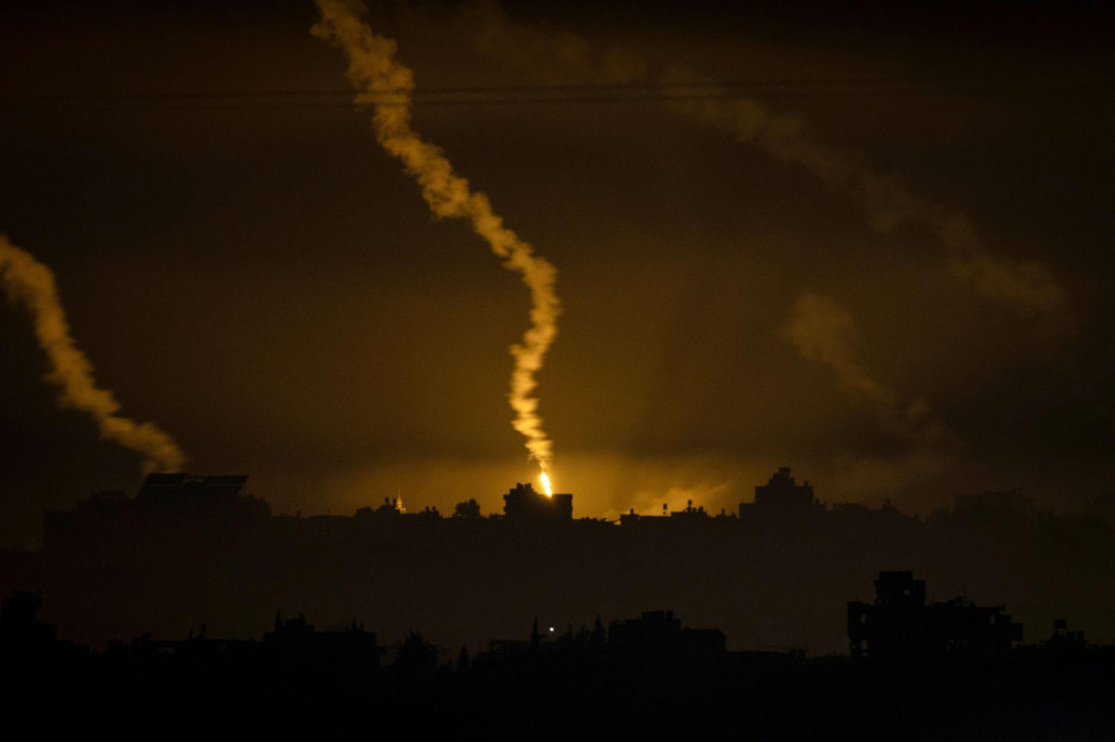 &lt;p&gt;This picture taken from a position along the border with the Gaza Strip in southern Israel shows flares launched by Israeli forces above the Palestinian territory amid ongoing battles with the militant group Hamas, on November 16, 2023. Israel has vowed to eradicate Hamas in retaliation for the attacks of October 7, which killed 1,200 people, most of them civilians, according to Israeli officials. The Hamas-run health ministry in Gaza says the death toll from the military offensive has now topped 11,500, including thousands of children. (Photo by Kenzo TRIBOUILLARD/AFP)&lt;/p&gt;