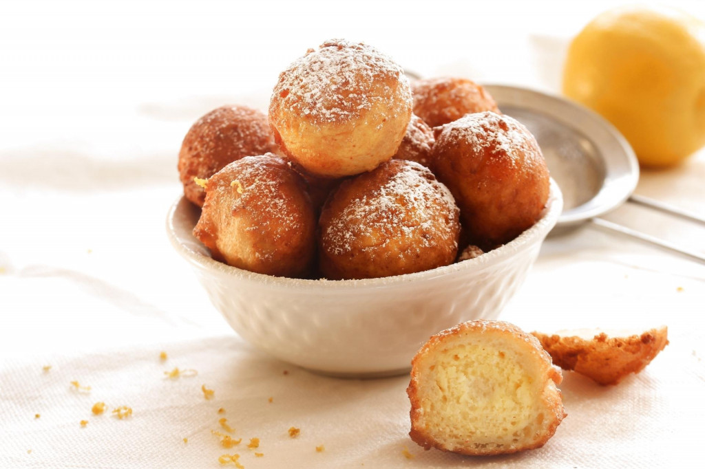 &lt;p&gt;Zeppole - Italian Ricotta Donuts dusted with powdered sugar on white background, selective focus&lt;/p&gt;