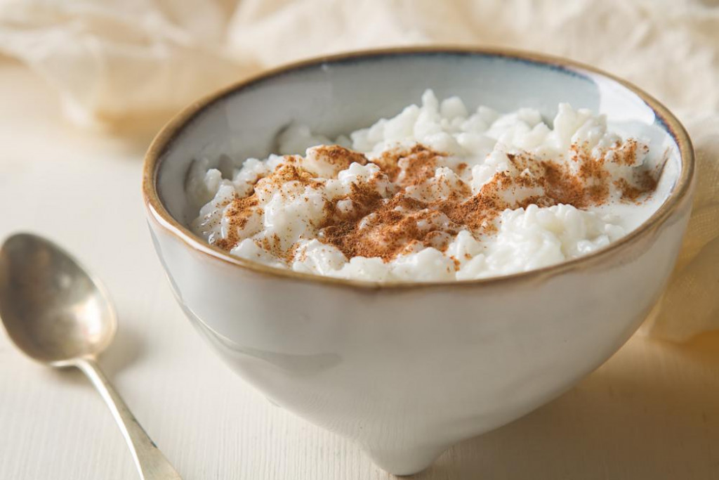 &lt;p&gt;Traditional rice pudding with cinnamon. Light background. Tasty and nutritious breakfast&lt;/p&gt;