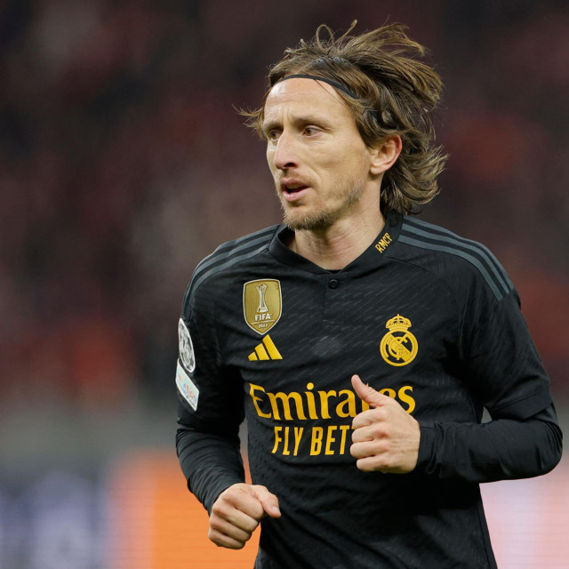 <p>Real Madrid&lsquo;s Croatian midfielder #10 Luka Modric looks on during the UEFA Champions League group C football match between Union Berlin and Real Madrid in Berlin, on December 12, 2023. (Photo by Odd ANDERSEN/AFP)</p>
