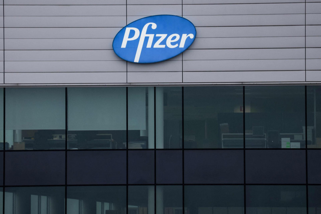 &lt;p&gt;(FILES) The logo of US multinational pharmaceutical company Pfizer, is pictured at a factory in Puurs, where Covid-19 vaccines are being produced for Britain, on December 3, 2020. Pfizer issued a disappointing 2024 forecast December 13, 2023, denting shares as the company navigates a profound plunge in sales tied to the Covid-19 pandemic. (Photo by Kenzo TRIBOUILLARD/AFP)&lt;/p&gt;