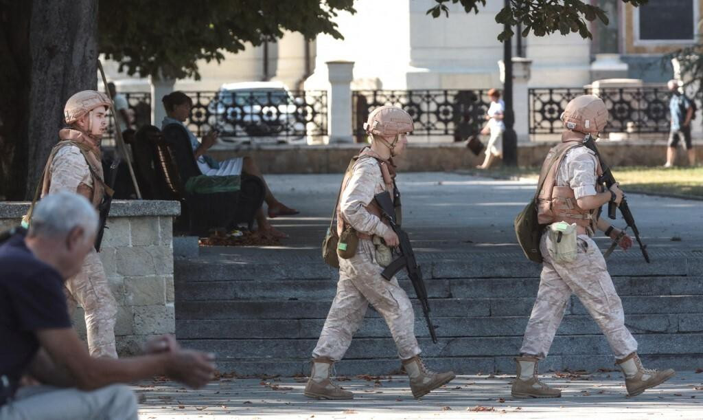 &lt;p&gt;Russian Navy members patrol in front of a headquarter of Russia‘s Black Sea Fleet in Sevastopol, in Crimea on July 31, 2022. Ukraine on July 31, 2022 denied carrying out a drone attack on the headquarters of the Russian Black Sea fleet in annexed Crimea, that Russian officials said wounded six personnel. (Photo by STRINGER/AFP)&lt;/p&gt;