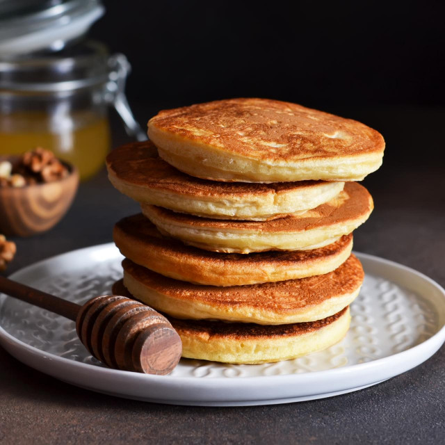 &lt;p&gt;Homemade, hot pancakes on the kitchen table. Traditional American dessert.&lt;/p&gt;