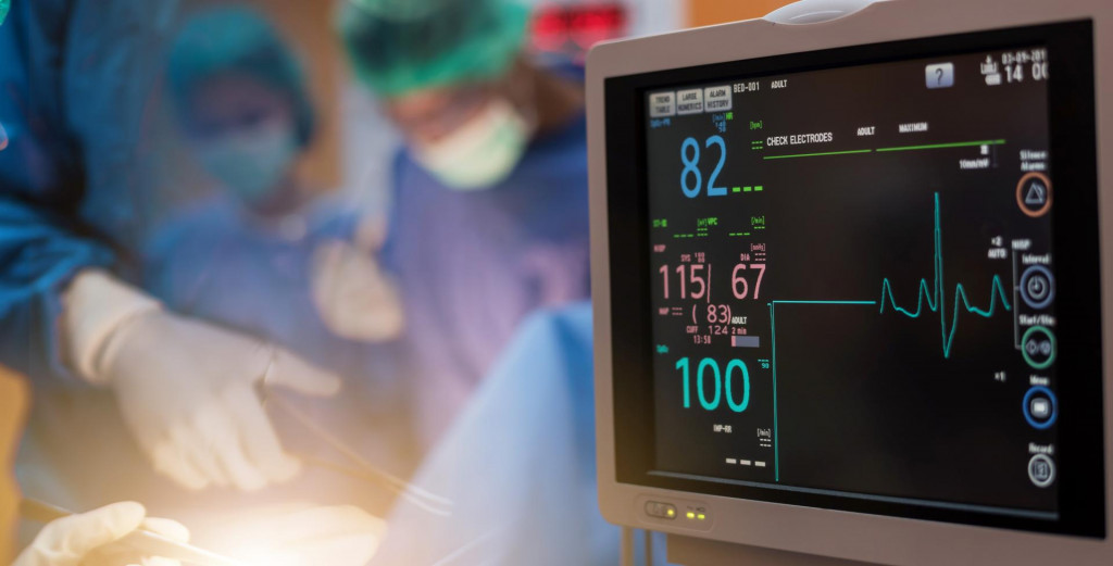 &lt;p&gt;Team of doctors or surgeons with electrocardiogram monitor in hospital surgery operating emergency room showing patient heart rate, during coronavirus or covid-19 crisis, medical concept.&lt;/p&gt;