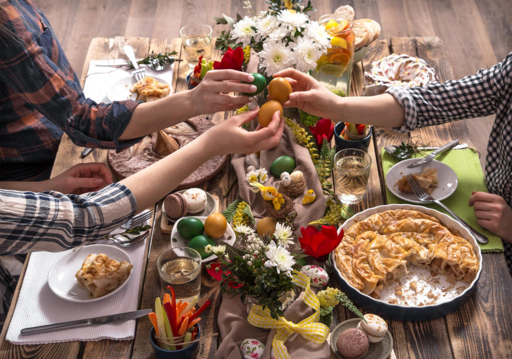 &lt;p&gt;Home Holiday friends or family at the festive Easter table with Easter colored eggs. The concept of the celebration&lt;/p&gt;