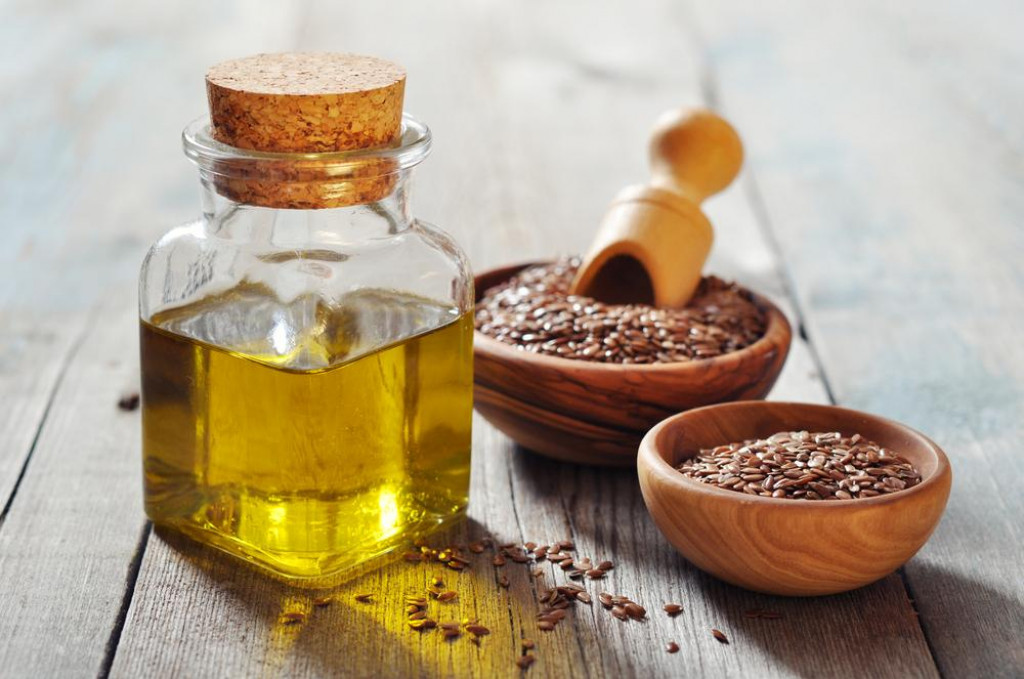 &lt;p&gt;Flax seeds and oil in bottle on wooden background&lt;/p&gt;
