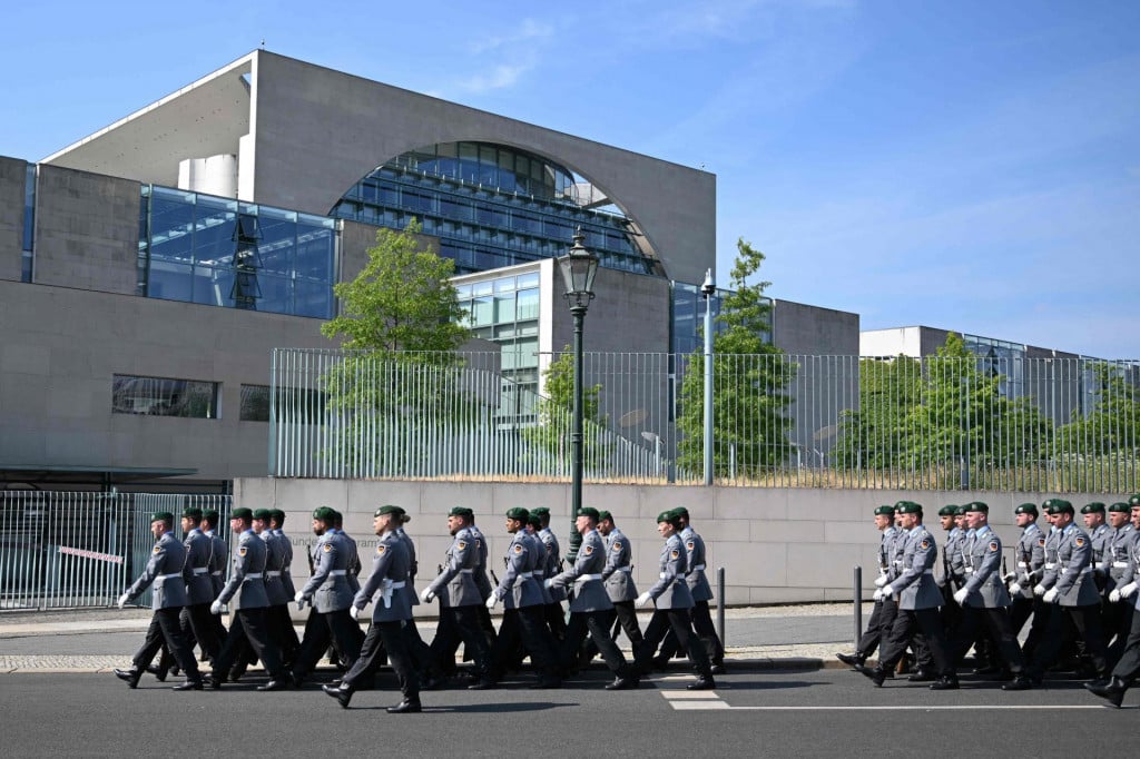 &lt;p&gt;Soldiers of the Wachbataillon, the honour guard of the German armed forces Bundeswehr, march past the Chancellery in Berlin, Germany on May 24, 2024. (Photo by RALF HIRSCHBERGER/AFP)&lt;/p&gt;