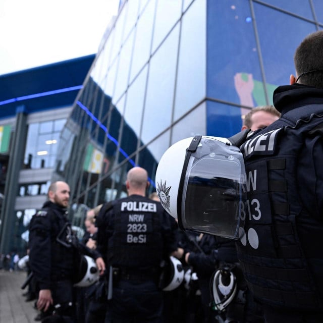 &lt;p&gt;Police officers gather in outside the stadium ahead of the UEFA Euro 2024 Group B football match between Spain and Italy at the Arena AufSchalke in Gelsenkirchen on June 20, 2024. (Photo by INA FASSBENDER/AFP)&lt;/p&gt;
