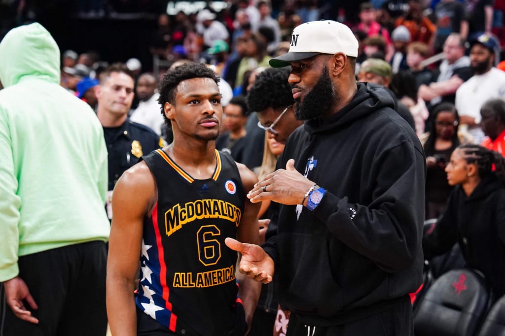 &lt;p&gt;(FILES) Bronny James #6 of the West team talks to Lebron James of the Los Angeles Lakers after the 2023 McDonald‘s High School Boys All-American Game at Toyota Center on March 28, 2023 in Houston, Texas. Bronny James, the 19-year-old son of Los Angeles Lakers superstar LeBron James, was selected 55th overall by the Los Angeles Lakers in June 27‘s second round of the NBA Draft.&lt;br&gt;
Four-time NBA Most Valuable Player LeBron James, the 39-year-old Lakers playmaker who is a four-time NBA champion, has said he would like to play alongside his son next season -- in what would be the first father-son combination in NBA history. (Photo by Alex Bierens de Haan/GETTY IMAGES NORTH AMERICA/AFP)&lt;/p&gt;