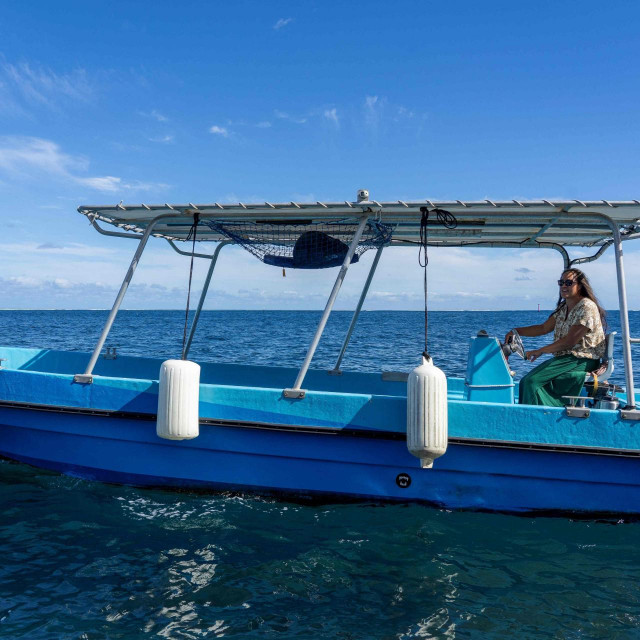 &lt;p&gt;Cindy Drollet drives a boat in the ocean near Tahiti‘s coast on May 26, 2024. She�s the only Teahupoo women captain driving surfers and visitors to the surf spot of Teahupo�o in every swell conditions. (Photo by Jerome Brouillet/AFP)&lt;/p&gt;