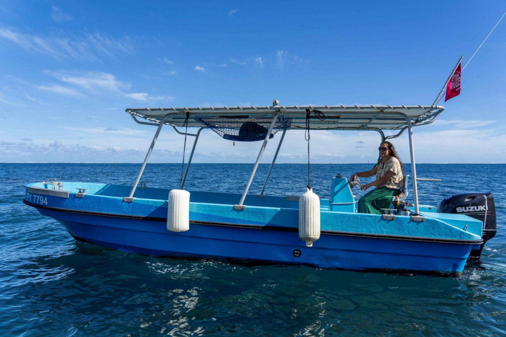 &lt;p&gt;Cindy Drollet drives a boat in the ocean near Tahiti‘s coast on May 26, 2024. She�s the only Teahupoo women captain driving surfers and visitors to the surf spot of Teahupo�o in every swell conditions. (Photo by Jerome Brouillet/AFP)&lt;/p&gt;