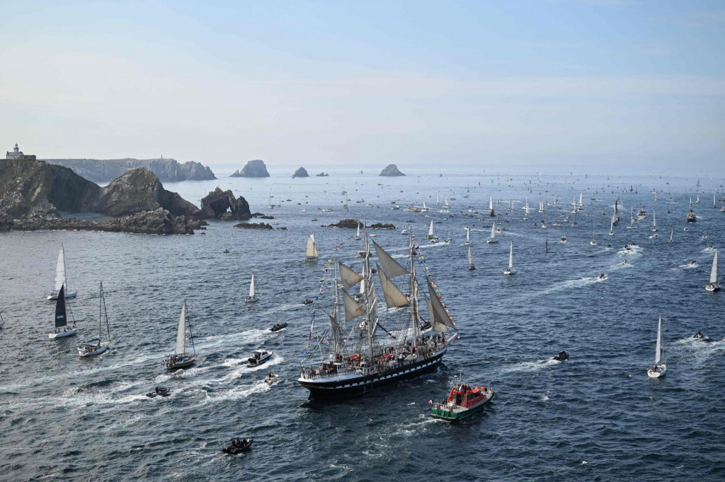 &lt;p&gt;This aerial photograph taken on July 18, 2024 outside Brest, northwestern France, shows old vessels sail as they attend the grand parade during the 8th Brest Maritime Festival. (Photo by Sebastien Salom-Gomis/AFP)&lt;/p&gt;