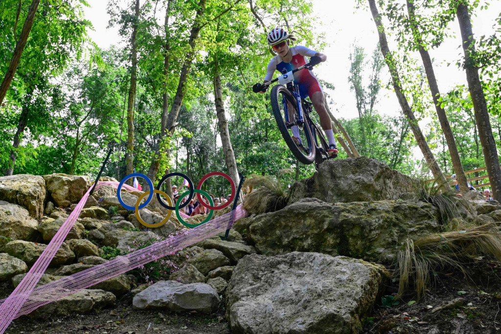 &lt;p&gt;France‘s Loana Lecomte competes in the women‘s cross-country mountain biking event during the Paris 2024 Olympic Games in Elancourt Hill venue in Elancourt, on July 28, 2024. (Photo by John MACDOUGALL/AFP)&lt;/p&gt;