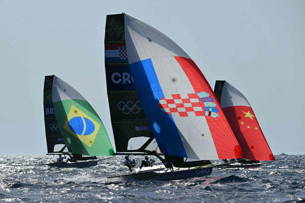 &lt;p&gt;Croatia‘s duo Sime Fantela and Sime Fantela compete in Race 3 of the men�s 49er skiff event during the Paris 2024 Olympic Games sailing competition at the Roucas-Blanc Marina in Marseille on July 28, 2024. (Photo by NICOLAS TUCAT/AFP)&lt;/p&gt;