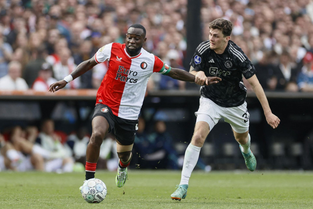 &lt;p&gt;(FILES) Feyenoord‘s Dutch defender #04 Lutsharel Geertruida (L) and Ajax‘s Bosnian midfielder #33 Benjamin Tahirovic (R) fight for the ball during the Dutch Eredivisie football match between Feyenoord and Ajax at the Feyenoord De Kuip stadium in Rotterdam, on April 7, 2024. Rotterdam Mayor Ahmed Aboutaleb on August 27, 2024, called off this weekend‘s football match between arch-rivals Feyenoord and Ajax due to a police strike, saying public safety ”cannot adequately be guaranteed.” (Photo by Pieter Stam de Jonge/ANP/AFP)/Netherlands OUT&lt;/p&gt;