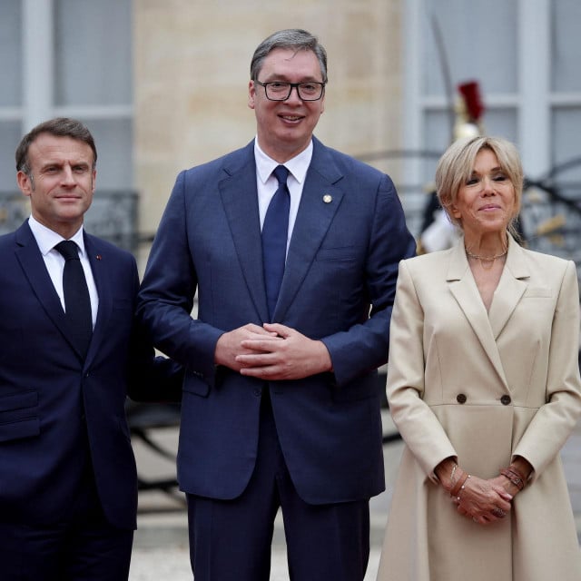 &lt;p&gt;France‘s President Emmanuel Macron (L) and his wife Brigitte Macron (R) greet Serbia‘s President Aleksandar Vucic (C) on arrival ahead of a reception for heads of state and governments ahead of the opening ceremony of the Paris 2024 Olympic Games, at the Elysee presidential palace in Paris, on July 26, 2024. (Photo by Valentine CHAPUIS/AFP)&lt;/p&gt;