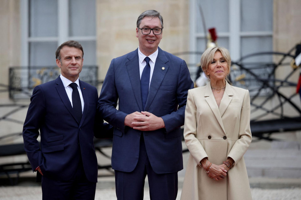 &lt;p&gt;France‘s President Emmanuel Macron (L) and his wife Brigitte Macron (R) greet Serbia‘s President Aleksandar Vucic (C) on arrival ahead of a reception for heads of state and governments ahead of the opening ceremony of the Paris 2024 Olympic Games, at the Elysee presidential palace in Paris, on July 26, 2024. (Photo by Valentine CHAPUIS/AFP)&lt;/p&gt;