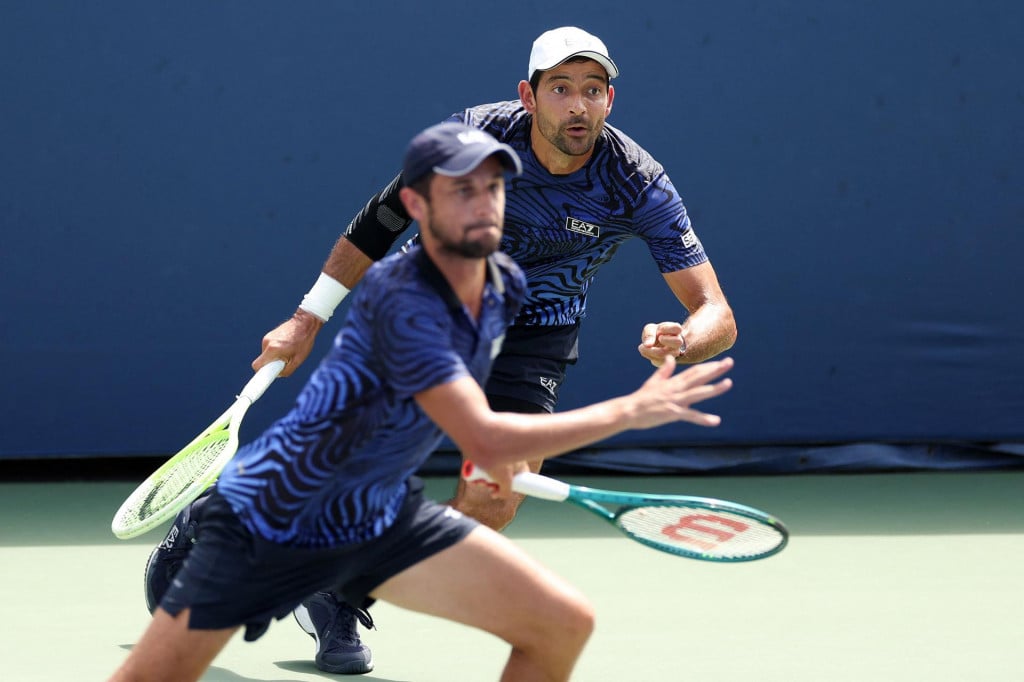 &lt;p&gt;NEW YORK, NEW YORK - AUGUST 28: Mate Pavic of Croatia (L) and Marcelo Arevalo of El Salvador in action against Giovanni Mpetshi Perricard and Arthur Fils of France during their Men‘s Doubles First Round match on Day Three of the 2024 US Open at USTA Billie Jean King National Tennis Center on August 28, 2024 in the Flushing neighborhood of the Queens borough of New York City. Sarah Stier/Getty Images/AFP (Photo by Sarah Stier/GETTY IMAGES NORTH AMERICA/Getty Images via AFP)&lt;/p&gt;