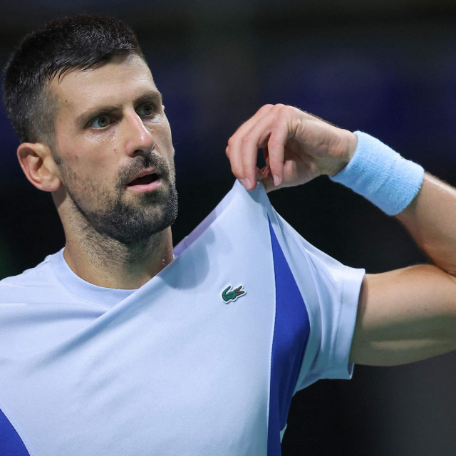 &lt;p&gt;Serbia‘s Novak Djokovic looks on during a tennis training session at the ”Aleksandar Nikolic� hall, ahead of the Davis Cup World Group I Serbia against Greece on September 14 and 15, in Belgrade, on September 11, 2024. (Photo by Marko Djokovic/AFP)&lt;/p&gt;