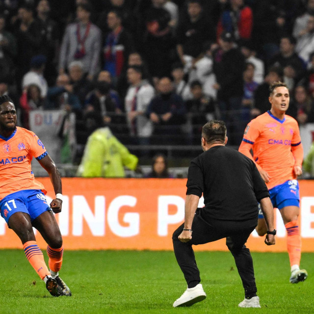 &lt;p&gt;Marseille‘s English forward #17 Jonathan Rowe (L) celebrates scoring his team‘s third goal during the French L1 football match between Olympique Lyonnais (OL) and Olympique de Marseille at The Groupama Stadium in Decines-Charpieu, central-eastern France, on September 22, 2024. (Photo by JEFF PACHOUD/AFP)&lt;/p&gt;