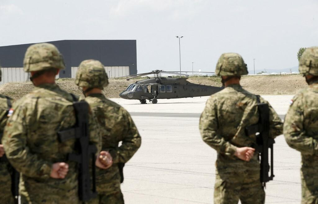 &lt;p&gt;Croatian soldiers in front of the UH-60M Black Hawk helicopter, a donation from the United States of America to the Republic of Croatia, at the military airport in Zagreb on May 25, 2022 during the official handover. The United States donated helicopters UH-60M Black Hawk to Croatia as part of strengthening cooperation between the two countries and NATO in Eastern Europe. (Photo by Denis LOVROVIC/AFP)&lt;/p&gt;