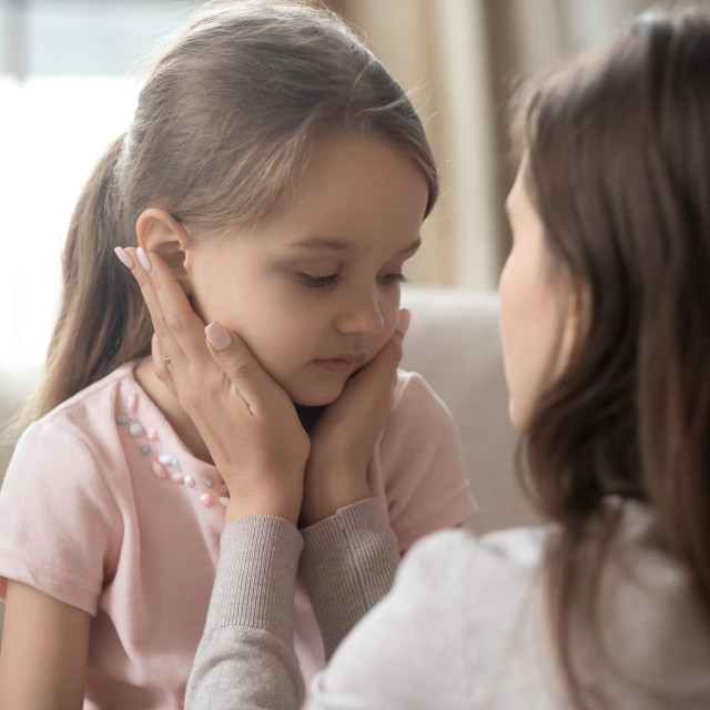 &lt;p&gt;Loving young mother touching upset little daughter face, expressing support, young mum comforting offended adorable preschool girl, showing love and care, child psychologist concept, close up&lt;/p&gt;