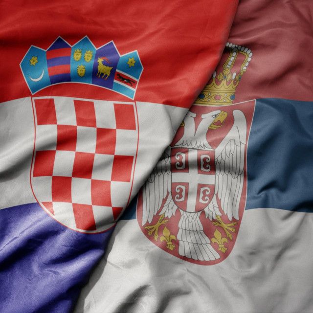 &lt;p&gt;big waving national colorful flag of croatia and national flag of serbia. macro&lt;/p&gt;