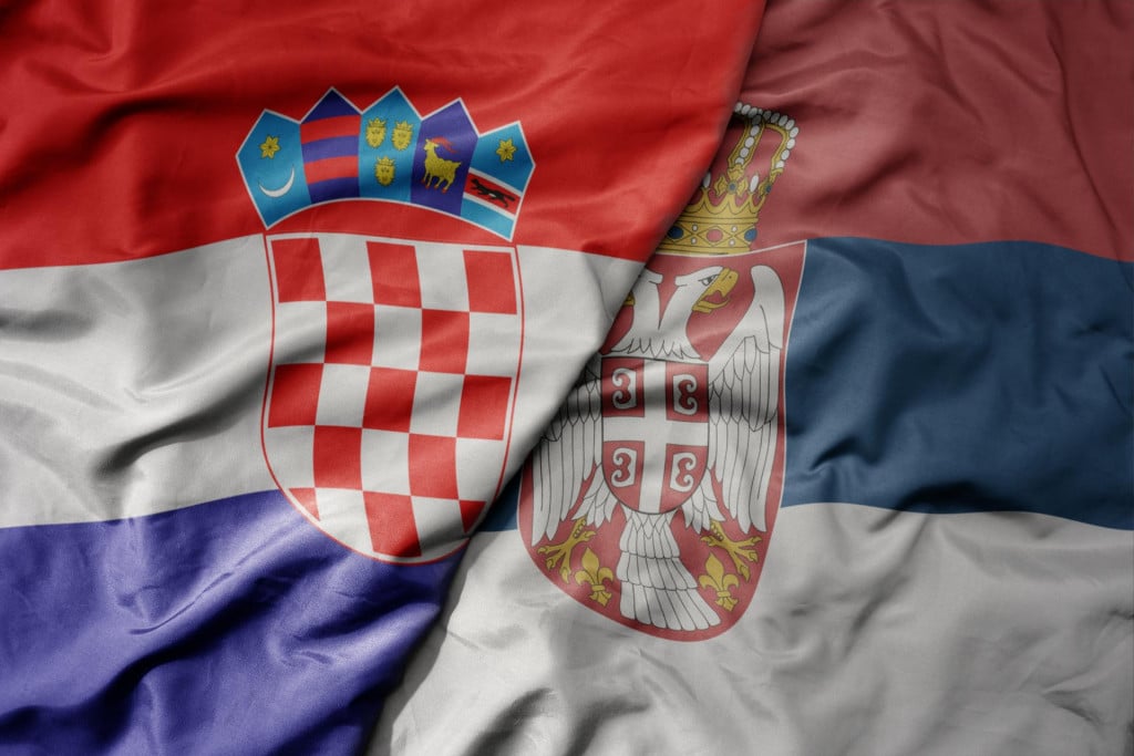 &lt;p&gt;big waving national colorful flag of croatia and national flag of serbia. macro&lt;/p&gt;