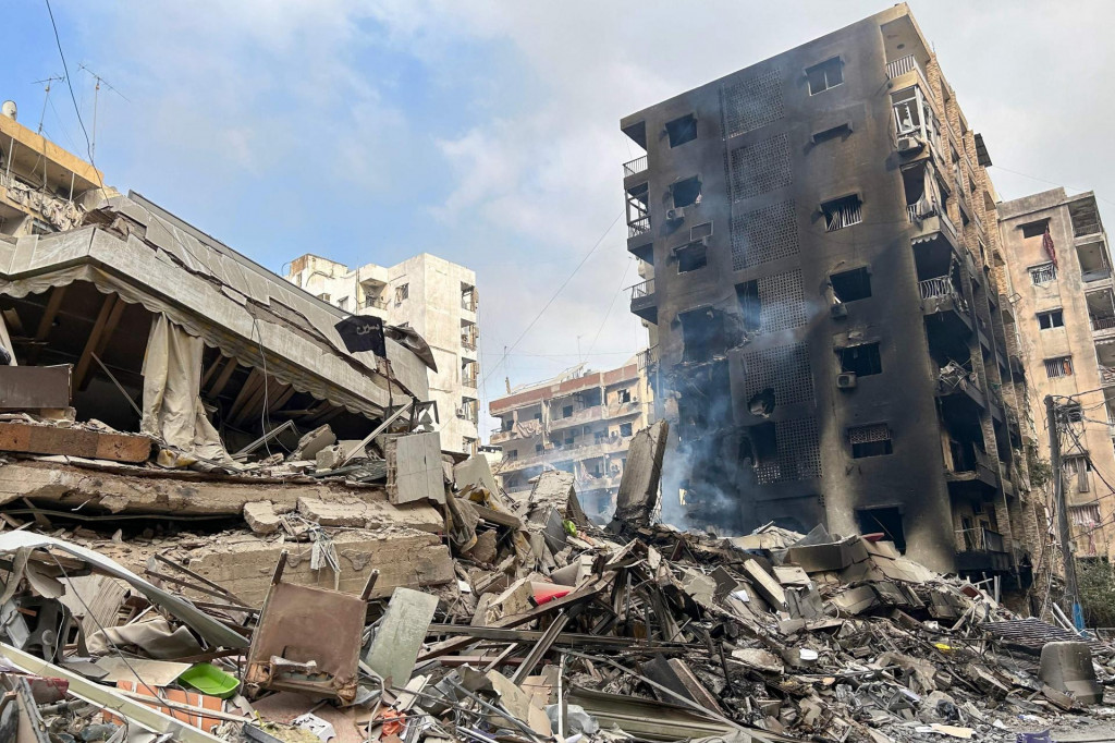 &lt;p&gt;Smoke billows from building rubble at the site of an Israeli overninght airstrike that targeted Beirut‘s southern suburb Rouweiss neighbourhood on October 10, 2024. The United States urged its ally Israel to avoid Gaza-like military action in Lebanon, after Prime Minister Benjamin Netanyahu said it could face ”destruction” like the Palestinian territory. (Photo by Anwar AMRO/AFP)&lt;/p&gt;