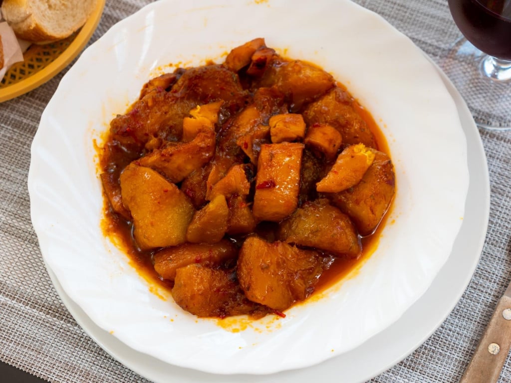 Popular spanish dish Patatas con sepia, stewed cuttle with potatoes and souse