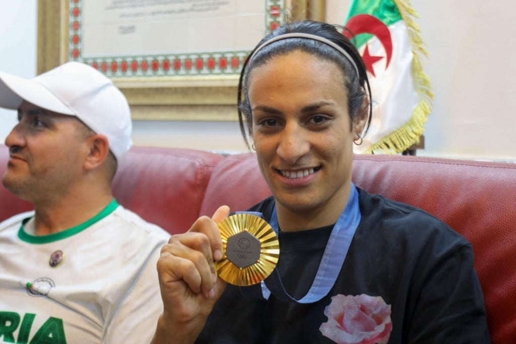 &lt;p&gt;Algerian gold medallist Imane Khelif poses for a picture as she sits with relatives in her hometown city of Tiaret on August 16, 2024. (Photo by AFP)&lt;/p&gt;