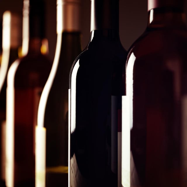 &lt;p&gt;Bottles of old aged wine collection in a row in winery cellar&lt;/p&gt;